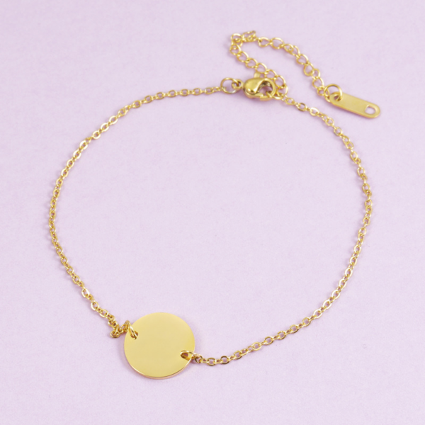 Pulsera con placa circular